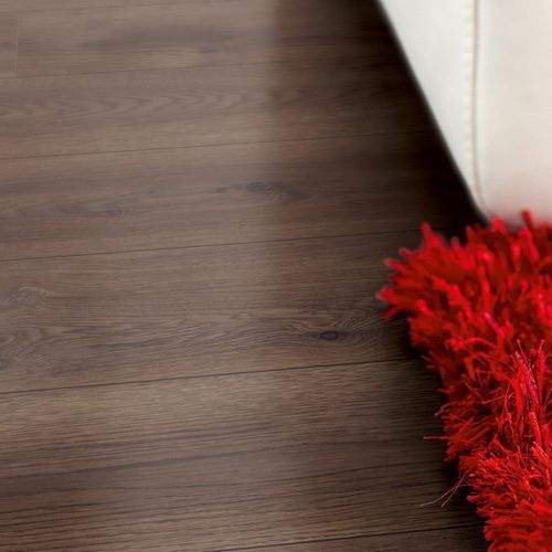 sol stratifié chêne chocolat nuance jtm parquet.jpg